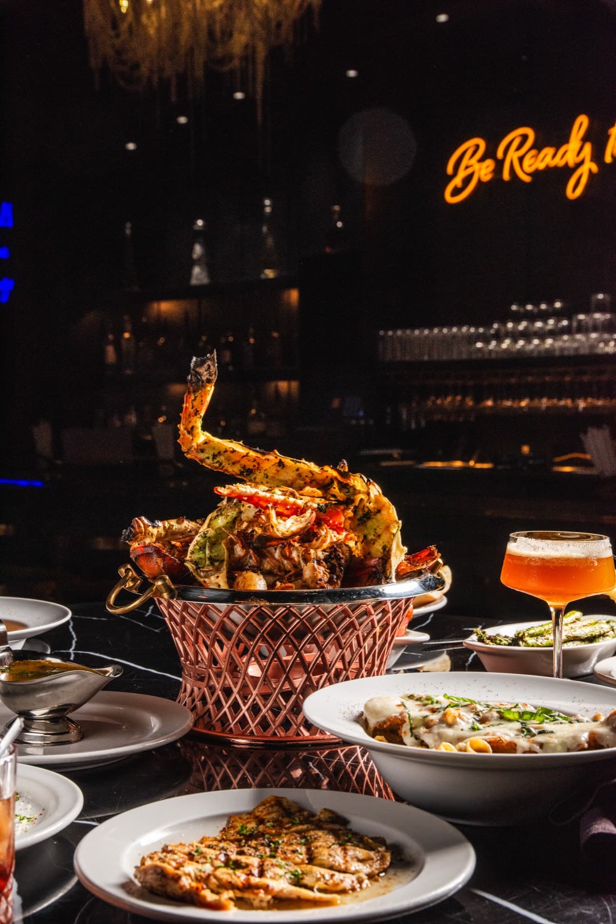 A seafood tower and cocktail at Provaré